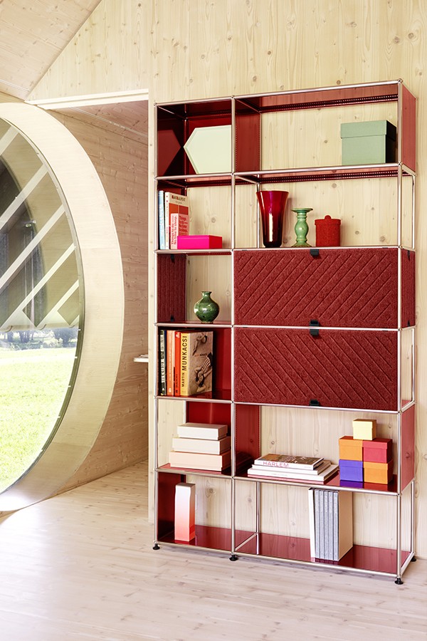 USM Haller bookcase in red with soft panelling