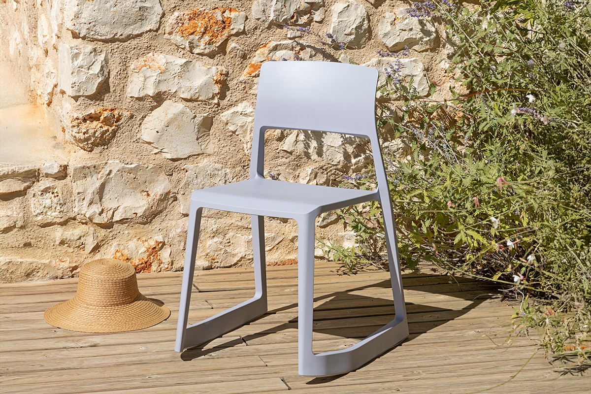 Vitra Tip Ton RE Chair in outdoor setting with lavendar backdrop