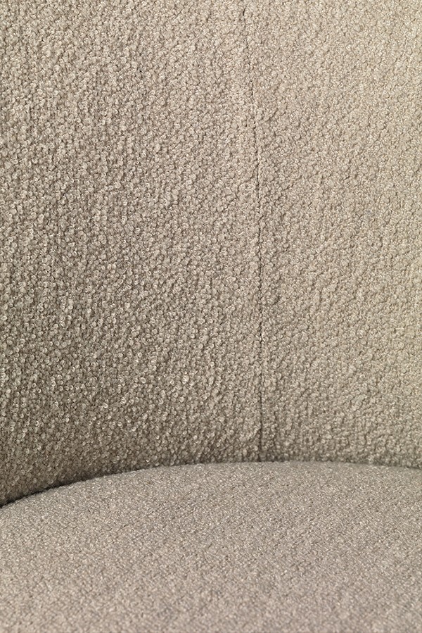 Close up detail of the Ferm Living Rico Lounge Chair in natural Boucle upholstery