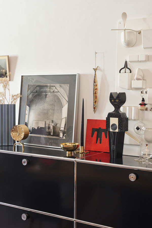 Vitra Wooden Cat on top of a black USM sideboard