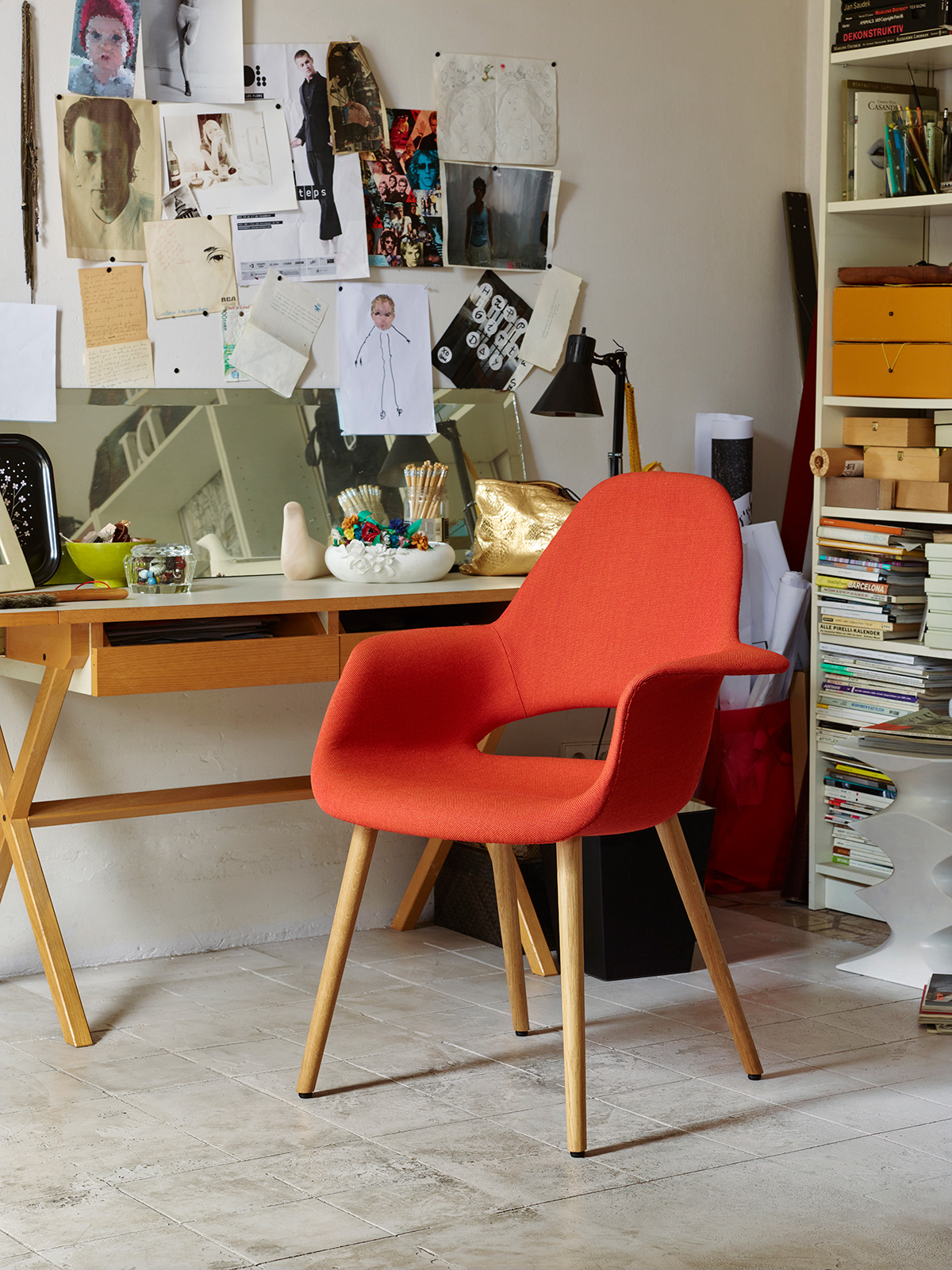 The Vitra Organic Conference Chair at a desk