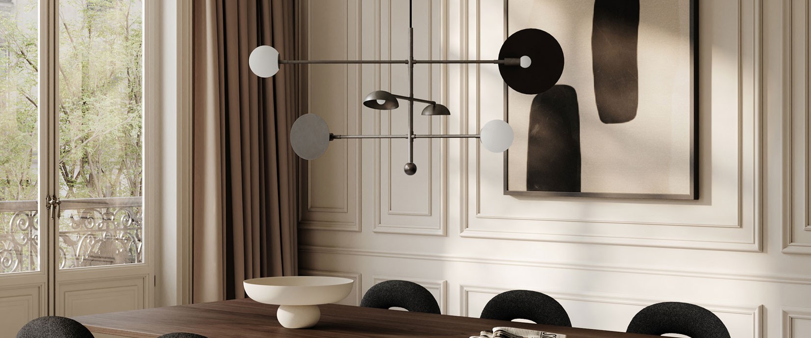 Sculptural pendant light suspended above a wooden dining table