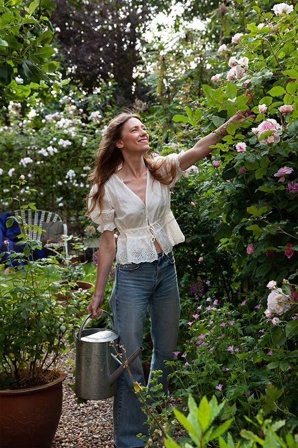 Portrait of Stina Hasan in her garden