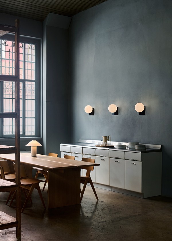 3 &Tradition SHY2 Journey Wall Lights against a dark blue wall