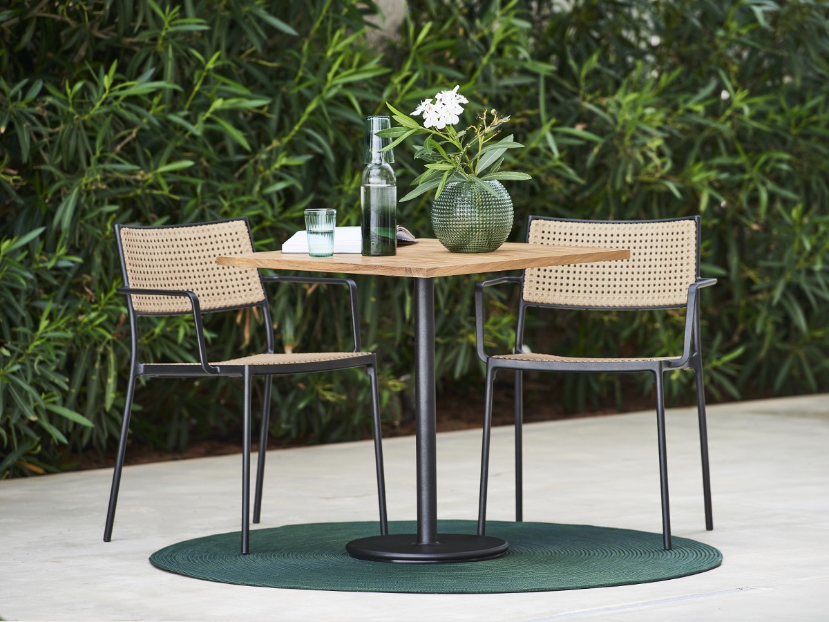 Buy the Caneline Less Outdoor Dining Armchair Set of Two at nest.co.uk